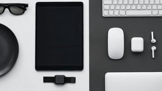 Flat lay of aesthetic gadgets including a white keyboard, wireless mouse, tablet pc on a clean desk